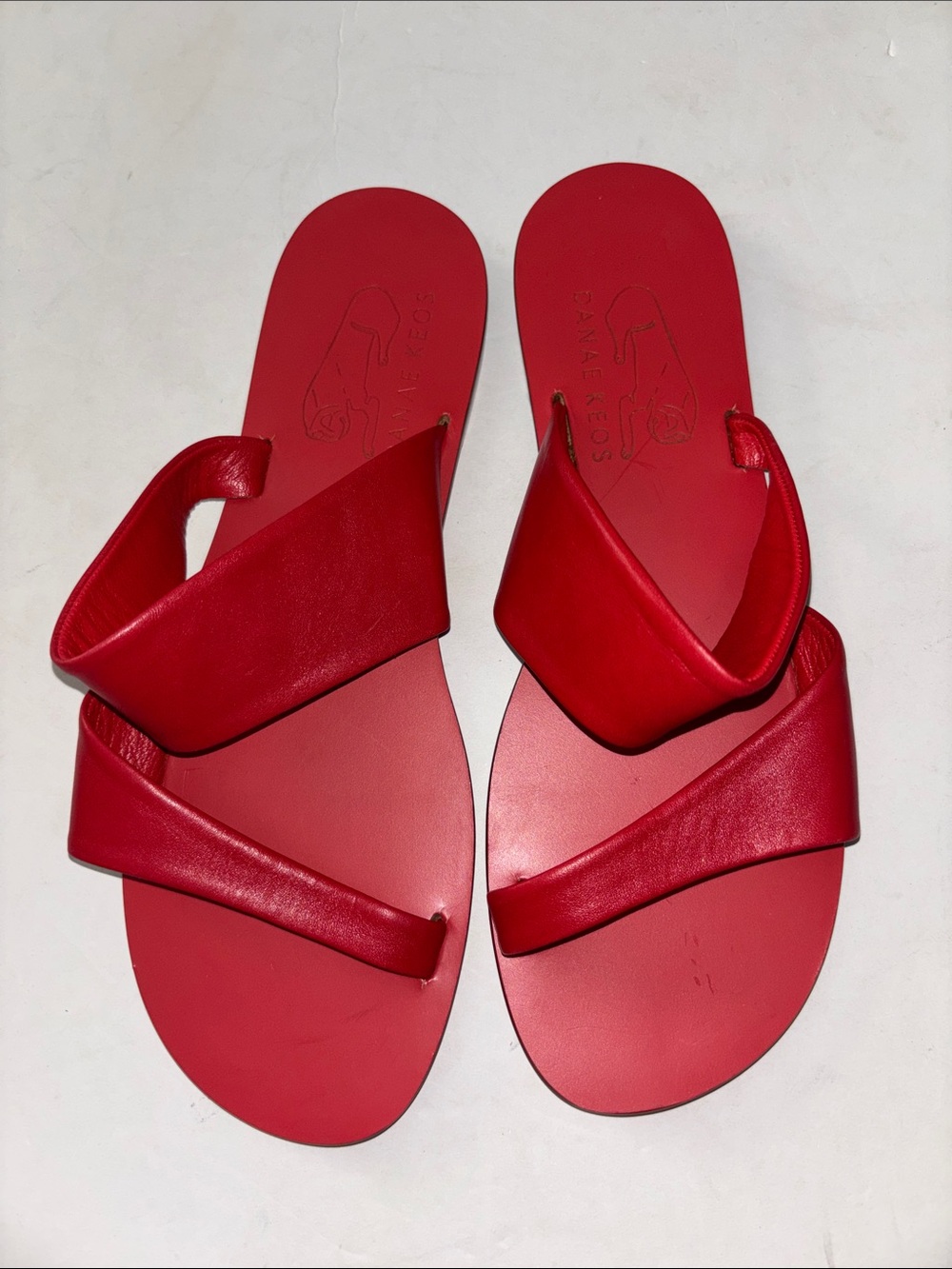 DANAE KEOS RED LEATHER SLIDES SIZE
39 UK….SIZE 9 US TWO LEATHER STRAPS 
GORGEOUS